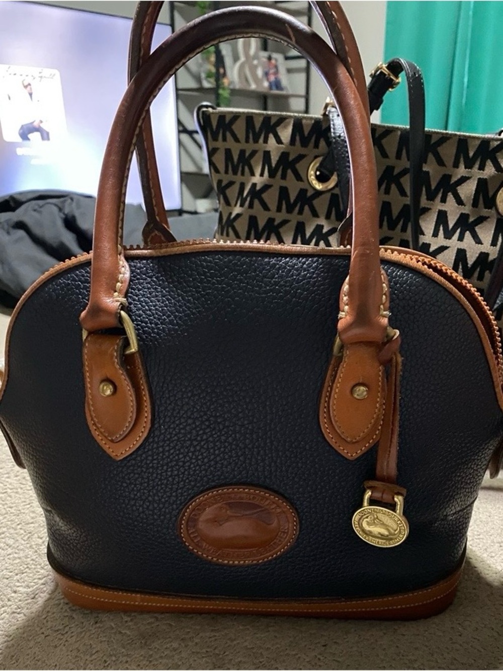 Dooney & Bourke Black Pebbled Leather Satchel with Brown Trim and Gold Hardware